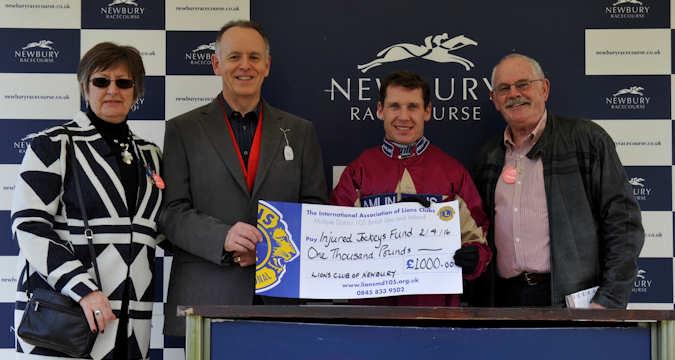 Lion Vice President Drew Presenting Cheque to Richard Johnson on behalf of the Injured Jockeys Fund